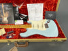 Fender Custom Shop 2017 electric guitar in light blue finish with maple neck in an orange plush-lined tweed hard case, including Fender Custom Guitar design guide, paperwork, care booklet, tremolo arm, and picks.