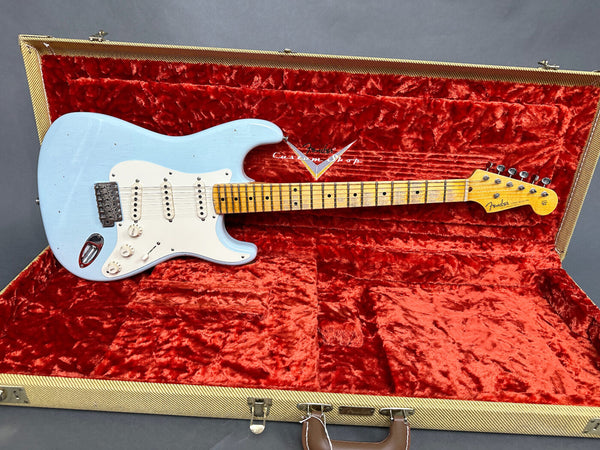 Light blue Fender Stratocaster electric guitar with maple neck and vintage white pickguard in tweed hard case with red plush interior from Coffee House Guitars
