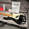 Fender black electric bass guitar with maple neck in open hard case with Fender manual and tags