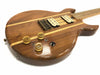 Natural wood finish electric guitar body with dual cream humbucker pickups and clear amber control knobs