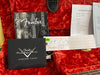 Fender Custom Shop guitar documents and warranty cards displayed on red plush guitar case lining with Coffee House Guitars pre-sales checklist for Fender Custom Shop guitar model.