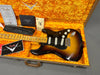 Fender Custom Shop vintage sunburst electric guitar with maple neck in plush orange lined hard case including certificate of authenticity, guitar strap, and Fender Custom Shop care instructions
