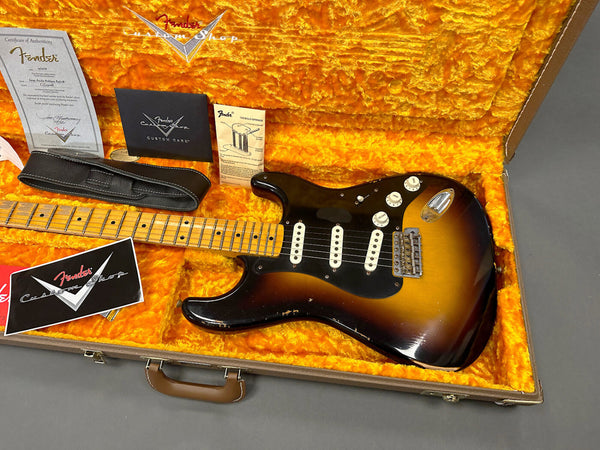 Fender Custom Shop vintage sunburst electric guitar with maple neck in plush orange lined hard case including certificate of authenticity, guitar strap, and Fender Custom Shop care instructions