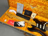 Fender Stratocaster electric guitar in sunburst finish inside vintage orange plush-lined hard case with Fender certificate of authenticity, strap, owner's manual, custom care booklet, and tremolo springs instruction sheet