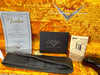 Fender Custom Shop Certificate of Authenticity for Strat Ancho Poblano Relic guitar with serial number CZ529068, Custom Care card, tremolo springs adjustment guide, black leather guitar strap, and yellow plush interior guitar case with Fender Custom Shop logo embroidery