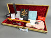 Fender Custom Shop 1991 relic pink electric guitar with maple neck and fretboard in tweed hardshell case with original Fender manuals, certificate of authenticity, custom care booklet, strap, and paperwork on red velvet interior