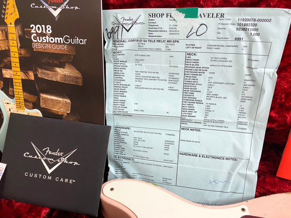 2018 Fender Custom Shop Custom Guitar Design Guide booklet, Fender Custom Shop Custom Care booklet, Fender Custom Shop build sheet for 2018 54 Tele Relic MN SPK guitar, partial view of pink Fender Telecaster guitar with white pickguard on red plush surface