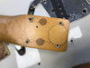 Close-up of vintage guitar neck heel showing screw holes and wood grain for guitar neck attachment to body on a white electric guitar