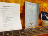 Fender 1963 Telecaster Relic guitar Certificate of Authenticity and Coffee House Guitars pre sales checklist with serial number R10278 displayed on orange plush guitar case lining with close-up of guitar fretboard