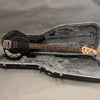 Black Music Man StingRay electric bass guitar with rosewood fretboard in open black plush-lined hard case