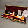 Fender Custom Shop sunburst electric guitar in tweed hard case with red plush interior, Fender certificate of authenticity and accessories.