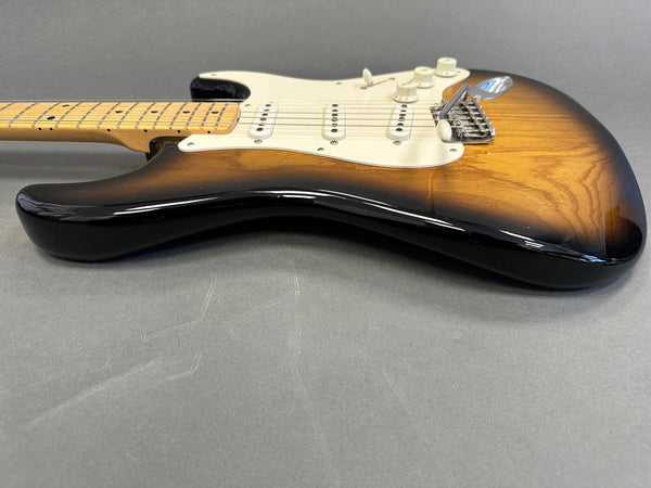 Close-up of sunburst electric guitar body with maple neck and white pickguard on gray background, Coffee House Guitars product listing image