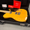 Fender electric guitar with maple neck and honey blonde finish in black plush hard case with Fender warranty and registration papers