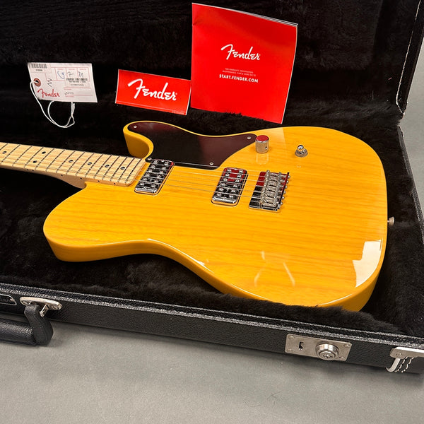 Fender electric guitar with maple neck and honey blonde finish in black plush hard case with Fender warranty and registration papers