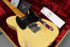 Vintage Fender Telecaster electric guitar with worn cream finish and black pickguard in red plush-lined hard case and Fender Custom Care booklet
