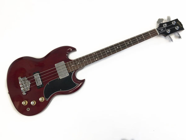 Gibson SG electric bass guitar with cherry red finish, black pickguard, and rosewood fretboard on white background