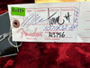 Fender guitar production tag showing RoHS compliance, handwritten prep, assembly, tune/test, and inspector signatures, part number R13756, serial number 11371832-88, on red plush background