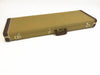 Fender tweed hard guitar case with brown leather trim and metal latches for electric guitar protection and transport.