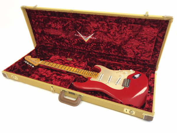 Fender Custom Shop vintage red Stratocaster electric guitar with maple fretboard in open tweed hard case with plush red interior lining