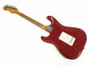Red electric guitar back view showing maple neck and tuning pegs on white background