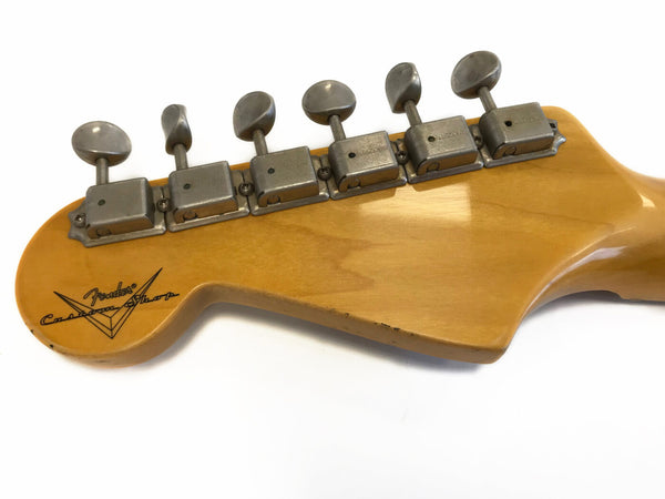 Vintage Fender Custom Shop guitar headstock with six vintage Kluson tuning machines on natural wood finish