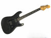 Black Fender Stratocaster electric guitar with rosewood fretboard and two humbucker pickups, maple headstock with Fender logo, vintage style tuning pegs, and black pickguard on white background.