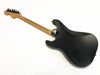 Black electric guitar with maple neck and black tuning pegs showing back side on white background