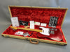 Fender vintage red sparkle Telecaster electric guitar with maple neck and white pickguard in tweed hard case with red plush interior, Fender certificate of authenticity, manual, and accessories.