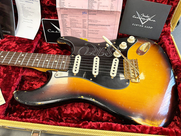 Fender Custom Shop vintage sunburst electric guitar with white pickups and tremolo arm in red velvet-lined case with Fender Custom Shop Custom Care paperwork