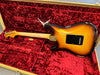 Vintage Fender Custom Shop Stratocaster electric guitar sunburst finish shown in red plush lined hard case back view