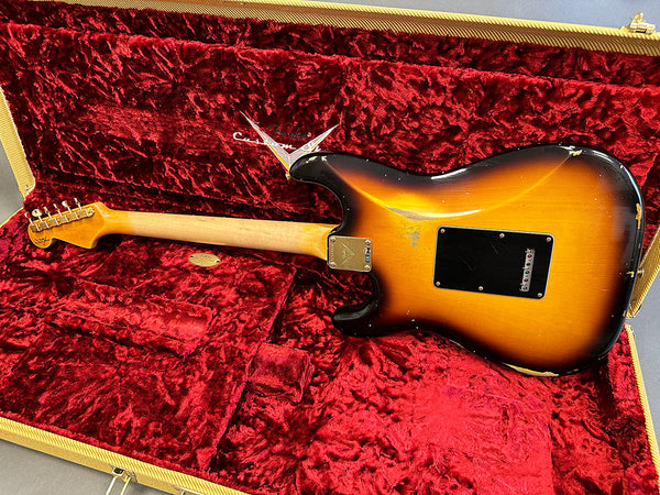 Vintage Fender Custom Shop Stratocaster electric guitar sunburst finish shown in red plush lined hard case back view