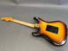 Vintage sunburst electric guitar with worn finish, showing backside and neck on gray background at Coffee House Guitars