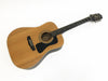 Seagull Acoustic Guitar natural finish with black pickguard and ebony fretboard on white background