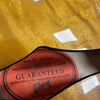 Close-up view of Gibson ES-335 Dot model guitar label inside the body showing serial number 08034918 and guarantee against faulty workmanship and materials