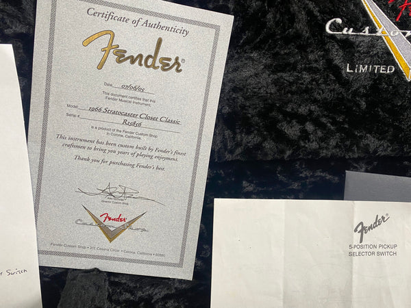 Fender Custom Shop Certificate of Authenticity for 1966 Stratocaster Closet Classic guitar with Fender logo and Custom Shop emblem on black plush guitar case lining, dated 07/06/05, and paper insert for Fender 5-position pickup selector switch.