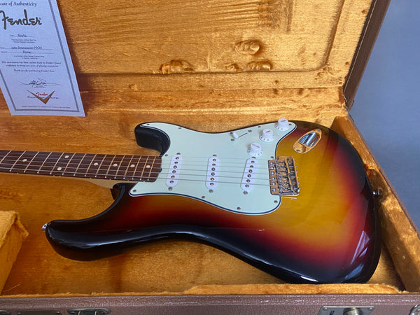 Fender 1960 Stratocaster NOS electric guitar in sunburst finish with rosewood fingerboard inside vintage hard case with certificate of authenticity