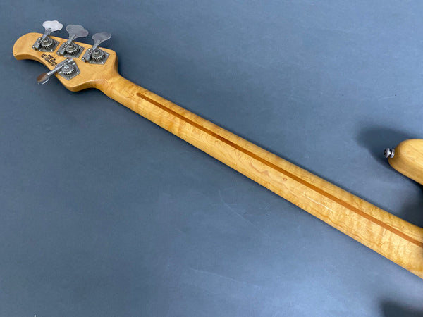 Back of maple guitar neck with tuning pegs and visible truss rod on gray background, Coffee House Guitars product image