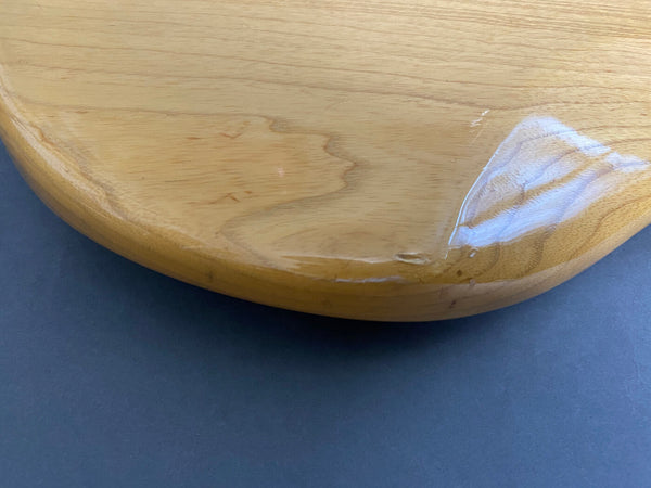 Close-up of natural wood finish on guitar body showing wear and small dings, detail image for Coffee House Guitars product listing