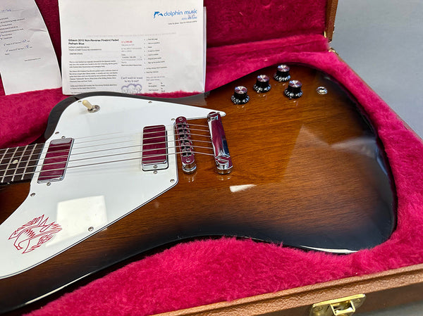 Gibson 2015 Non-Reverse Firebird Faded Pelham Blue electric guitar with white pickguard and red emblem inside brown hard case with pink plush lining and certificate from Dolphin Music