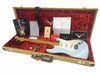 Fender Custom Shop electric guitar in light blue finish with maple neck and vintage-style tuning pegs in tweed hard case with red plush interior, including certificate of authenticity, Fender Custom Shop booklet, strap, tremolo arm, and additional Fender documentation and accessories.
