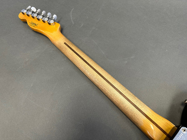 Back of a maple guitar neck with tuning pegs and truss rod stripe on gray background, Coffee House Guitars product image