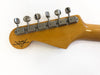 Fender Custom Shop guitar headstock with six chrome tuning pegs on natural wood finish neck