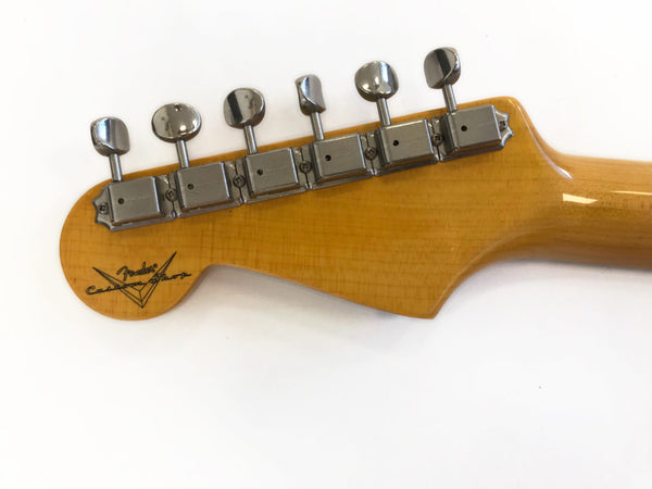 Fender Custom Shop guitar headstock with six chrome tuning pegs on natural wood finish neck