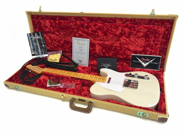 Fender Custom Shop vintage white electric guitar with maple neck in a red plush lined tweed hard case including certificate of authenticity, owner's manual, strap, and accessories