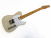 Fender Telecaster electric guitar with cream finish, maple neck and fretboard, white pickguard, and chrome hardware on white background.