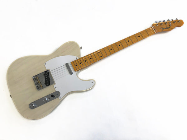 Fender Telecaster electric guitar with cream finish, maple neck and fretboard, white pickguard, and chrome hardware on white background.