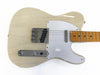Cream finish electric guitar with white pickguard, single-coil pickups, maple fretboard, and chrome control plate