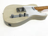 Cream colored electric telecaster-style guitar with chrome control knobs and white pickguard on white background