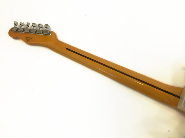 Back of maple guitar neck with dark wood stripe and six chrome tuning pegs on white background