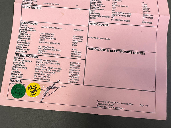 Close-up photo of a pink guitar specification sheet from Coffee House Guitars detailing hardware and electronics notes including bridge, pickups, controls, and switch types.